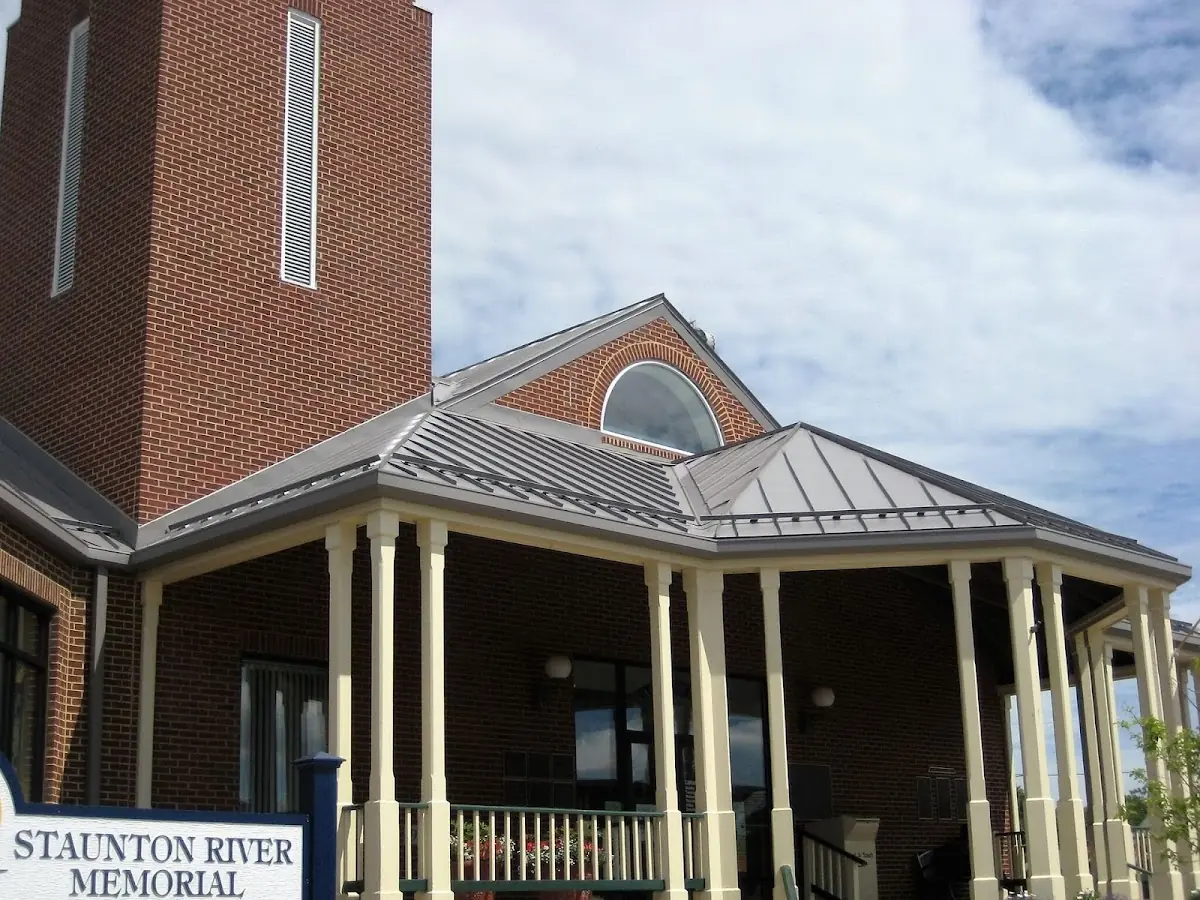 Skilled roofing craftsmen working on a residential roof in Glennville